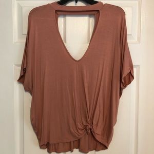 Tie-up front. Deep neck shirt.